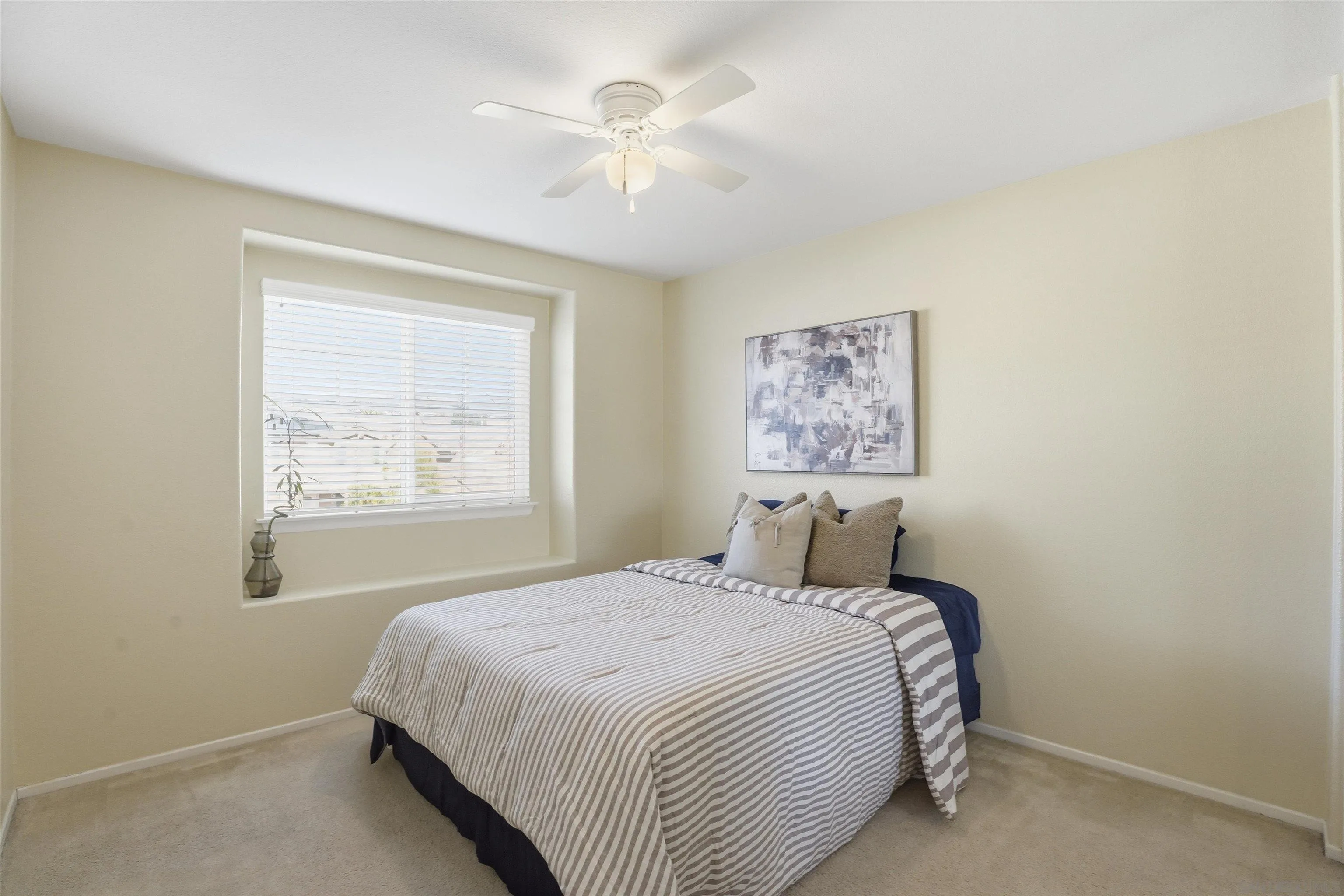 32892 Monte Drive Temecula, CA 92592 - Photo 56 of 60 a bedroom with a large bed and a window