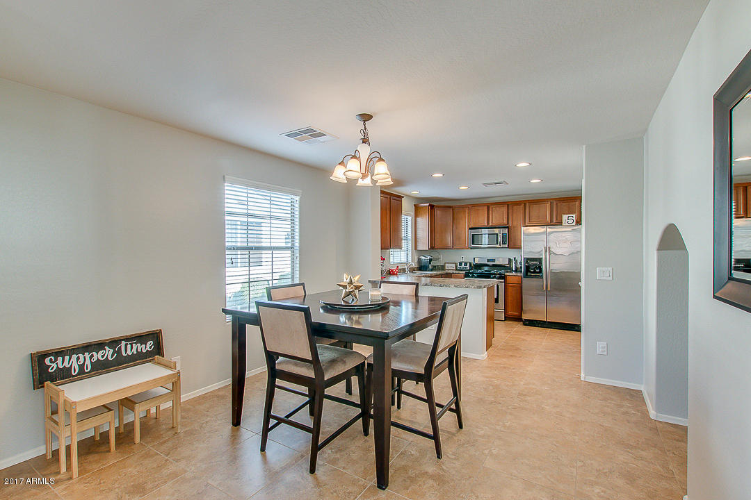 2126 South Seton Avenue Gilbert, AZ 85295 - Photo 3 of 26 Kitchen + Dinning