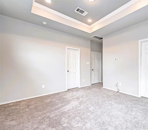 a bathroom with a shower and a sink