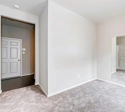 an empty room with closet