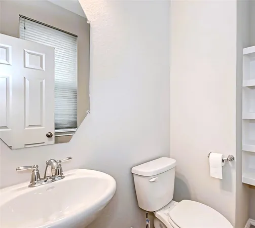 wooden floor in an empty room with a window and wooden floor