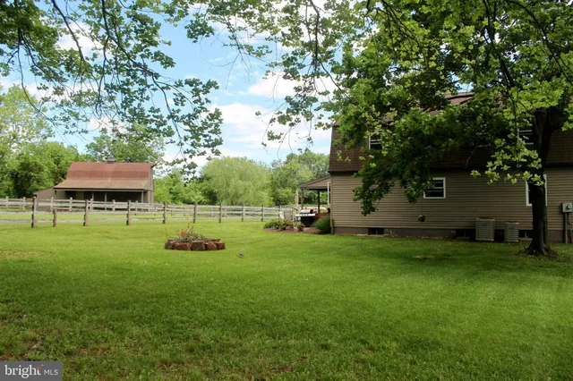 a view of a backyard of a house