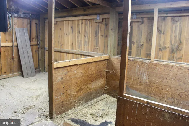 a view of parking garage with cars