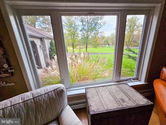 a view of a golf course with a lake