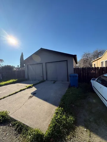 a house view with a backyard space