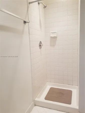 a bathroom with a white bath tub