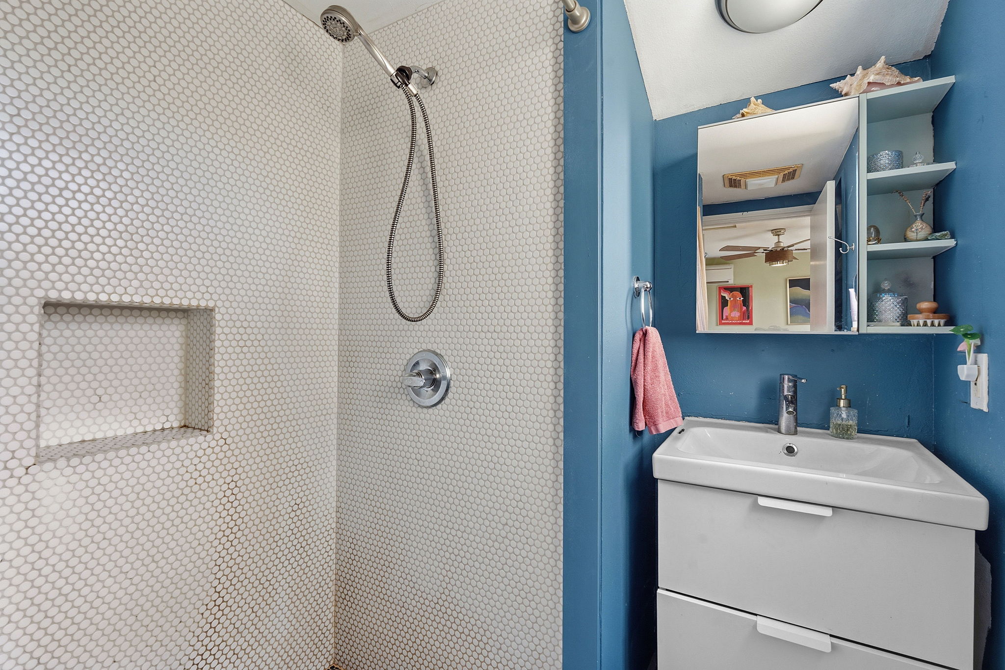 1112 Mission Ridge Austin, TX 78704 - Photo 16 of 22 a bathroom with a sink and a shower