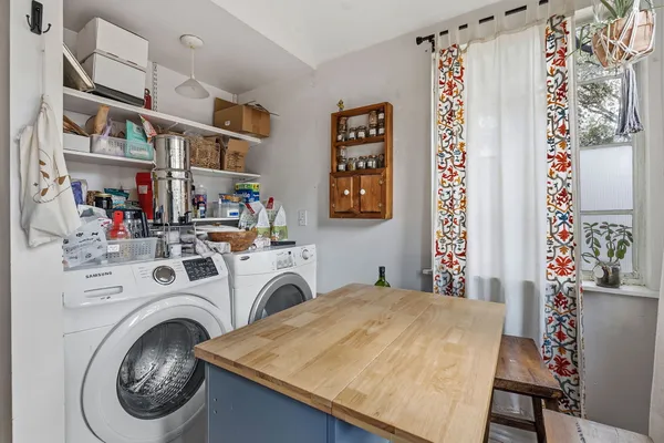 a utility room with dryer and washer