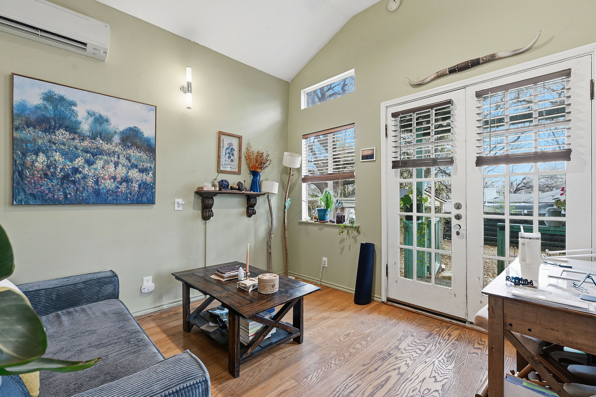 1112 Mission Ridge Austin, TX 78704 - Photo 21 of 22 a living room with furniture and a large window