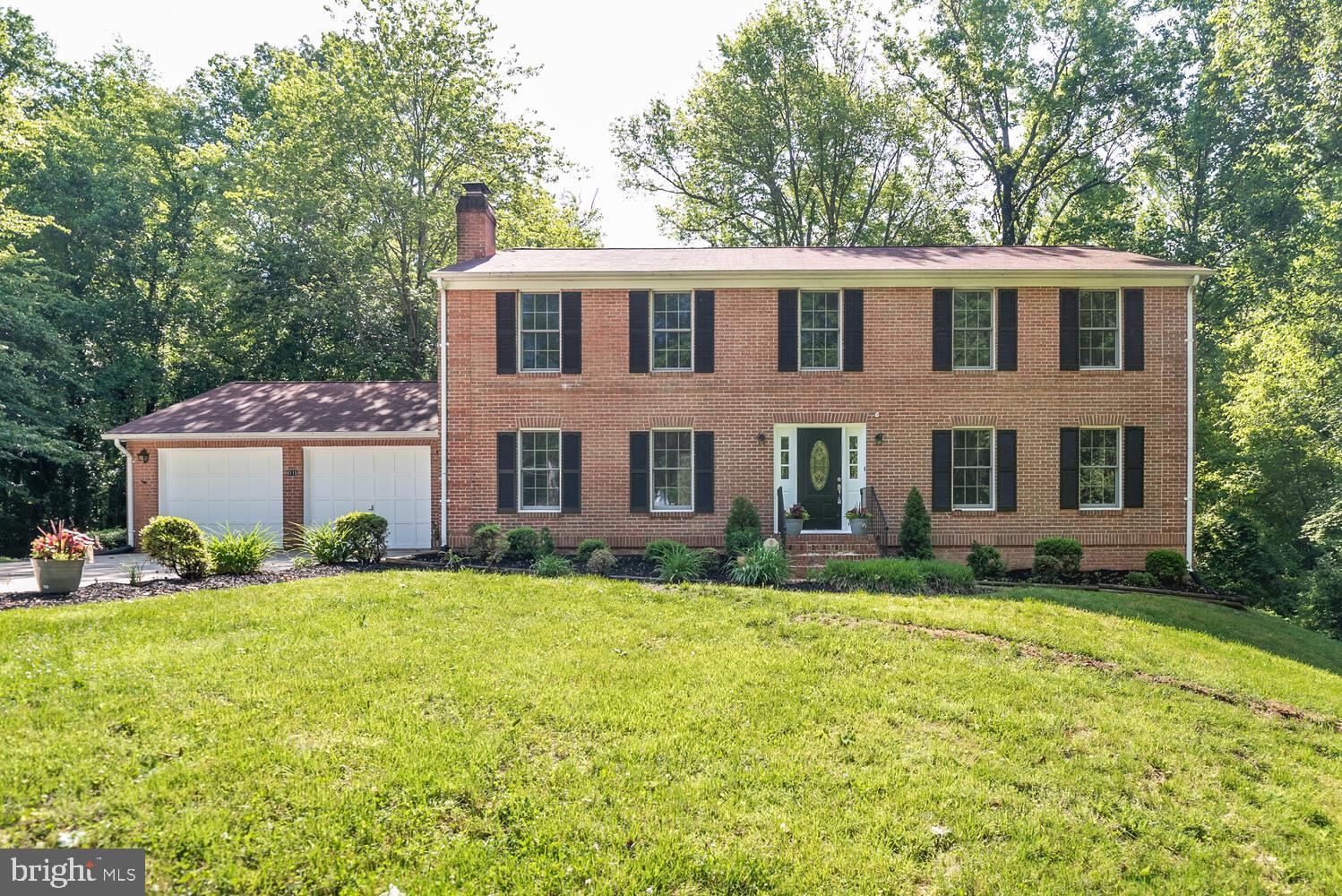 8115 Stacey Road Alexandria, VA 22308 - Photo 1 of 35 a view of a house with a yard