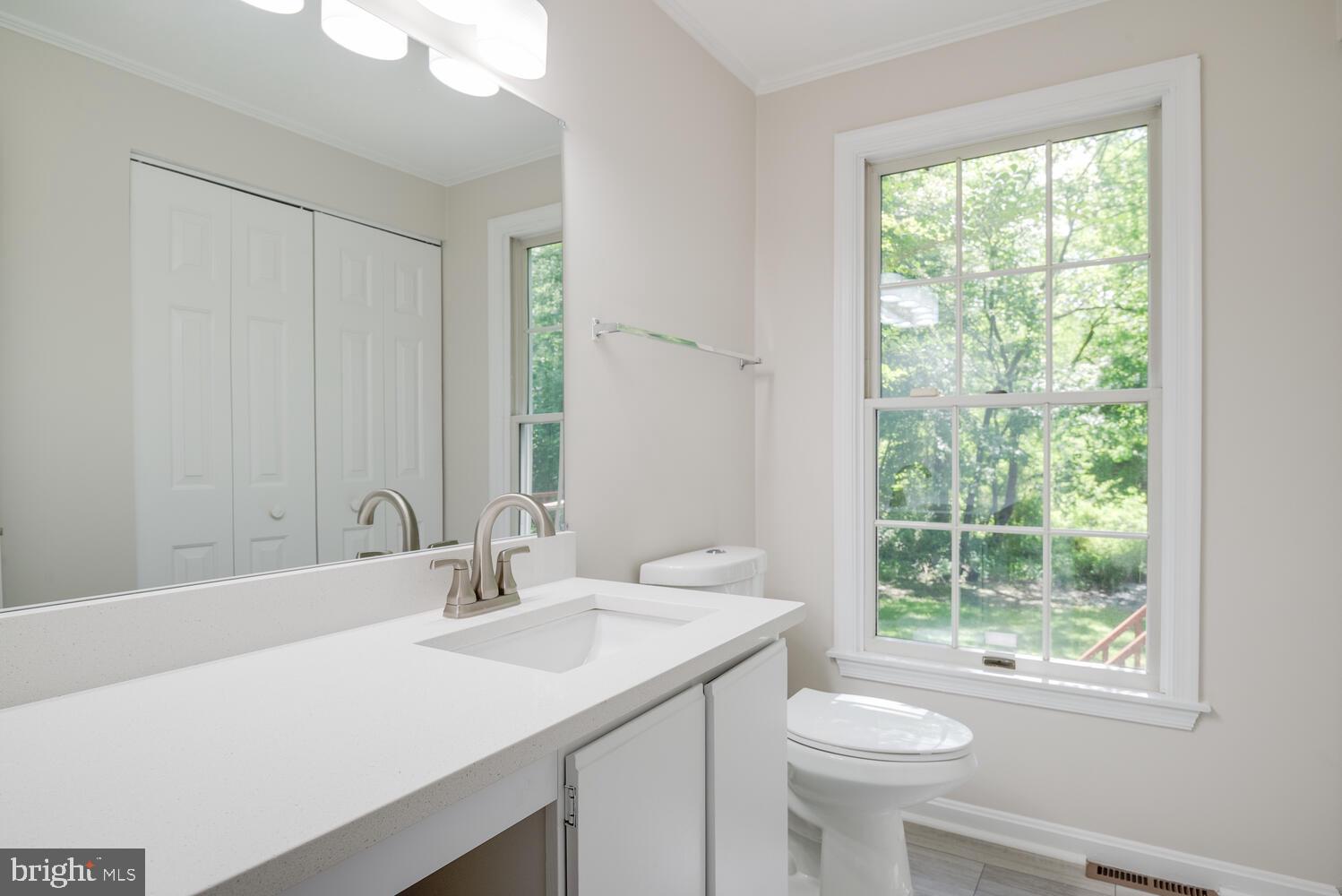 8115 Stacey Road Alexandria, VA 22308 - Photo 15 of 35 a bathroom with a sink and a toilet