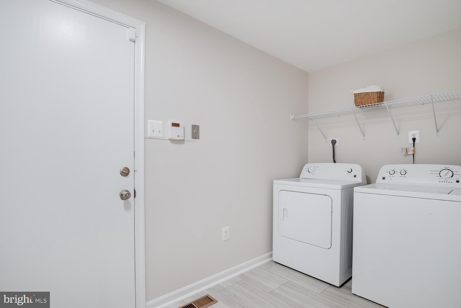 8115 Stacey Road Alexandria, VA 22308 - Photo 16 of 35 a utility room with dryer and washer