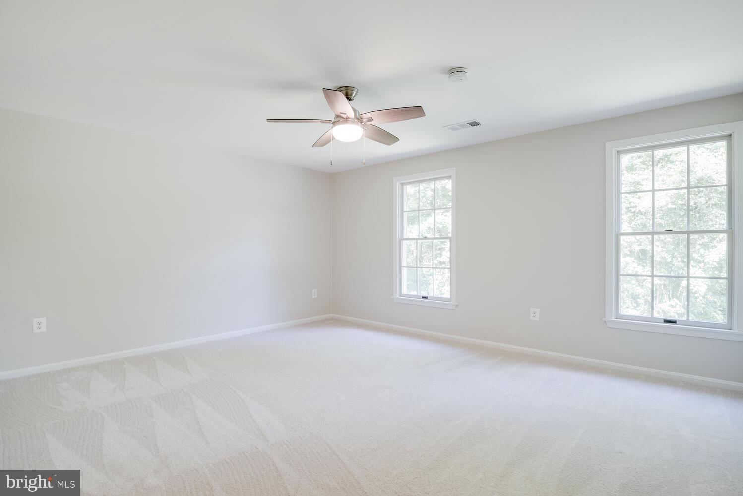 8115 Stacey Road Alexandria, VA 22308 - Photo 17 of 35 wooden floor in an empty room with a window
