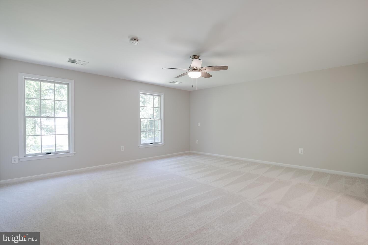 8115 Stacey Road Alexandria, VA 22308 - Photo 24 of 35 a view of an empty room with a window