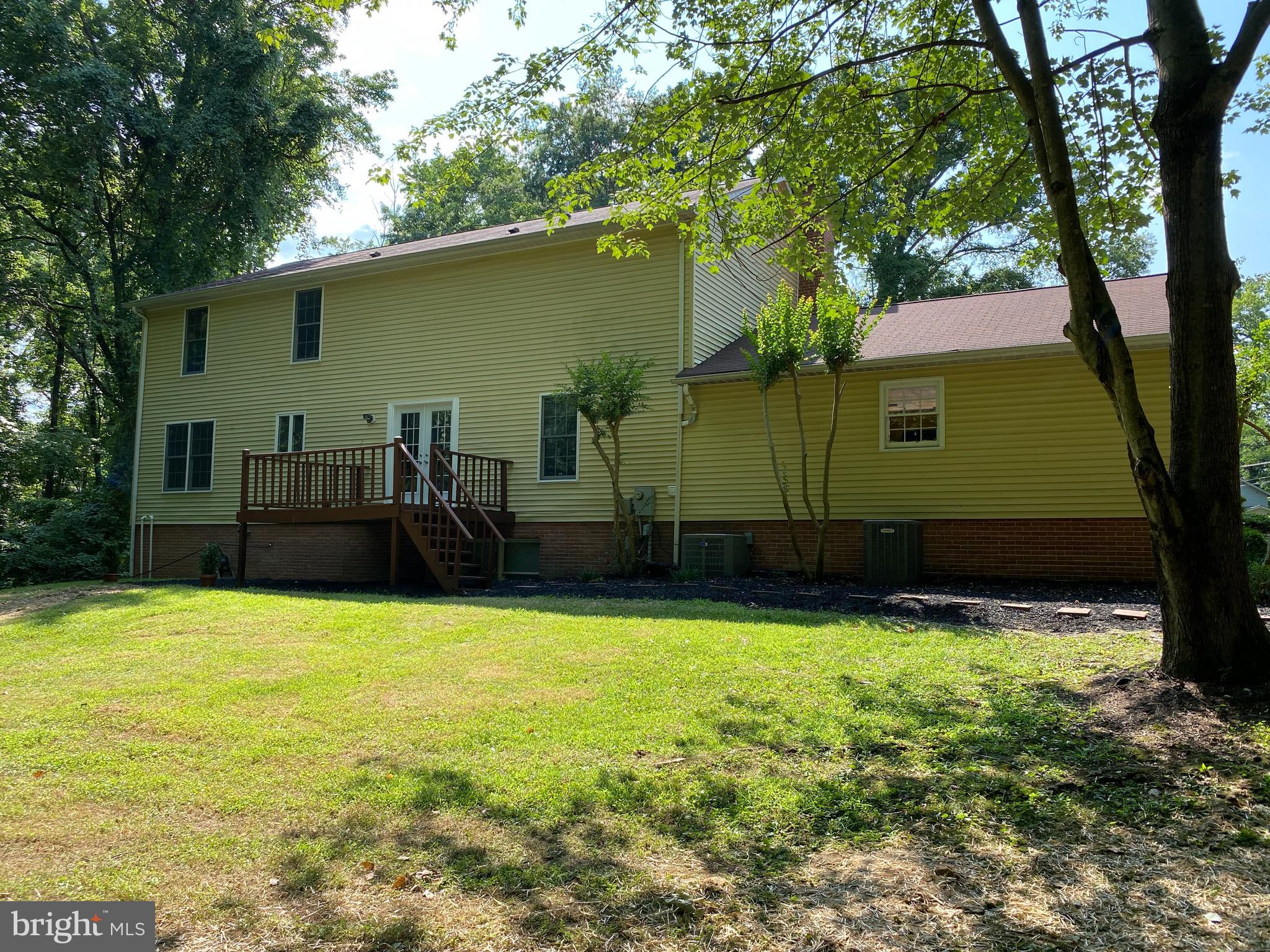 8115 Stacey Road Alexandria, VA 22308 - Photo 30 of 35 a view of swimming pool with a patio