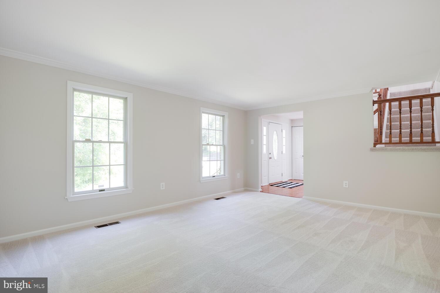8115 Stacey Road Alexandria, VA 22308 - Photo 5 of 35 an empty room with windows