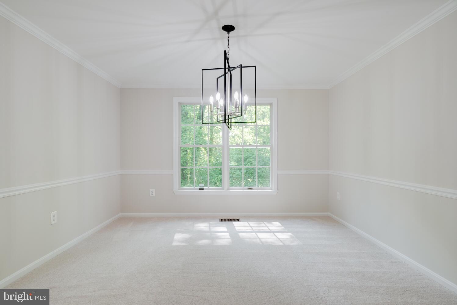 8115 Stacey Road Alexandria, VA 22308 - Photo 6 of 35 an empty room with a window