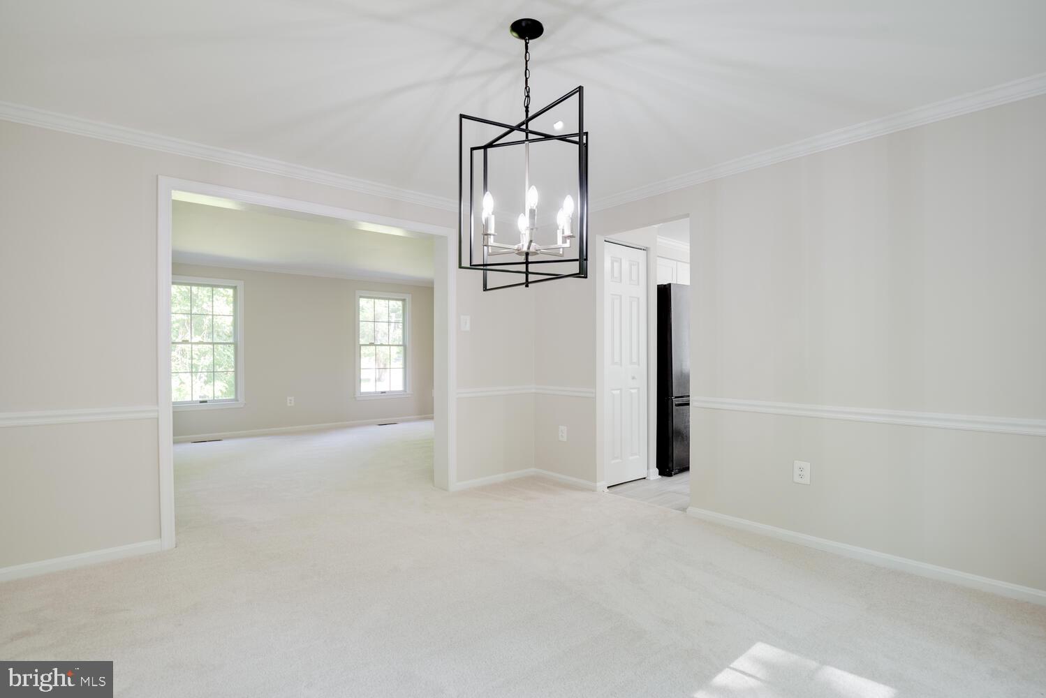 8115 Stacey Road Alexandria, VA 22308 - Photo 7 of 35 an empty room with windows and closet
