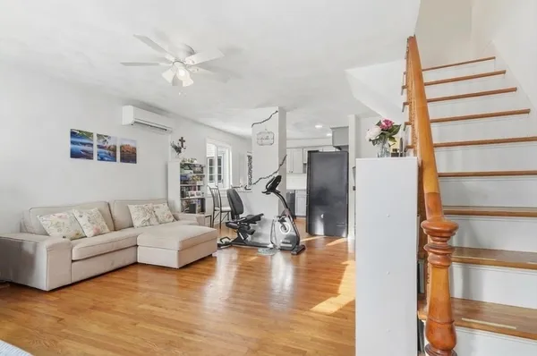 a living room with furniture and a table