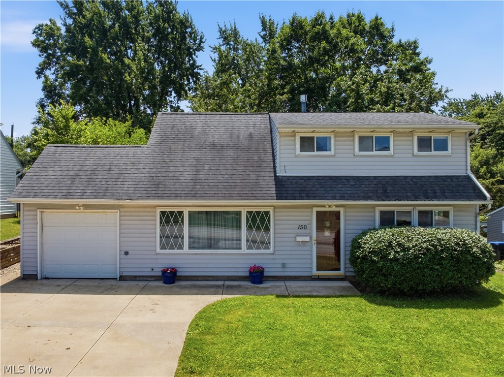 150 Graham Road Cuyahoga Falls, OH 44223 - Photo 4 of 38 Residence featuring light gray siding and a dark shingle roof