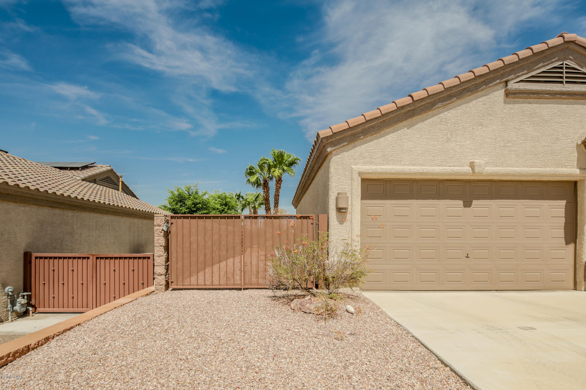 3889 Nottinghill Road Lake Havasu City, AZ 86404 - Photo 12 of 75 Side parking behind double gate.