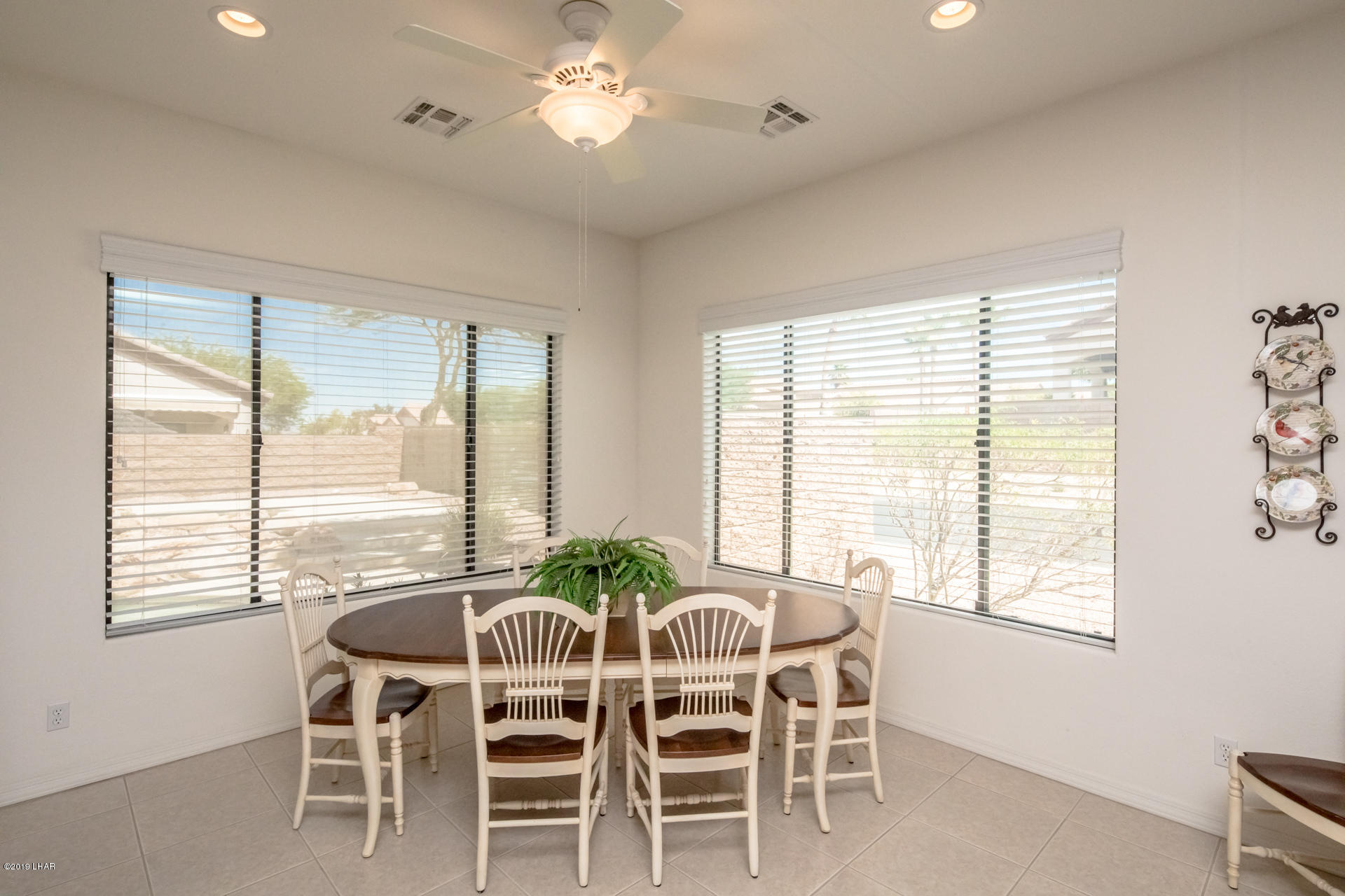 3889 Nottinghill Road Lake Havasu City, AZ 86404 - Photo 23 of 75 Dining room bright and cheery. Nice large window.