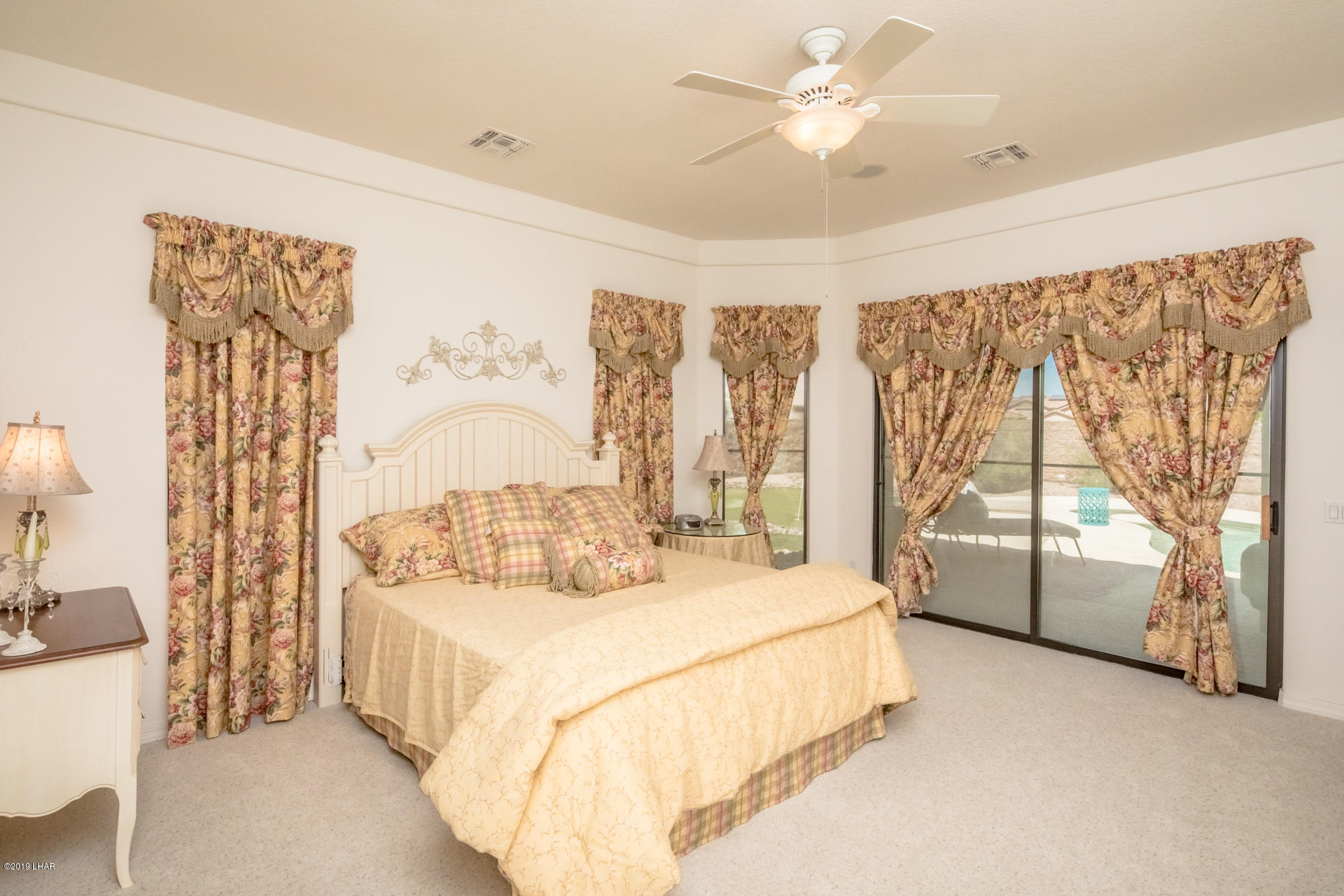 3889 Nottinghill Road Lake Havasu City, AZ 86404 - Photo 31 of 75 Master bedroom. Large slider and lots of light.