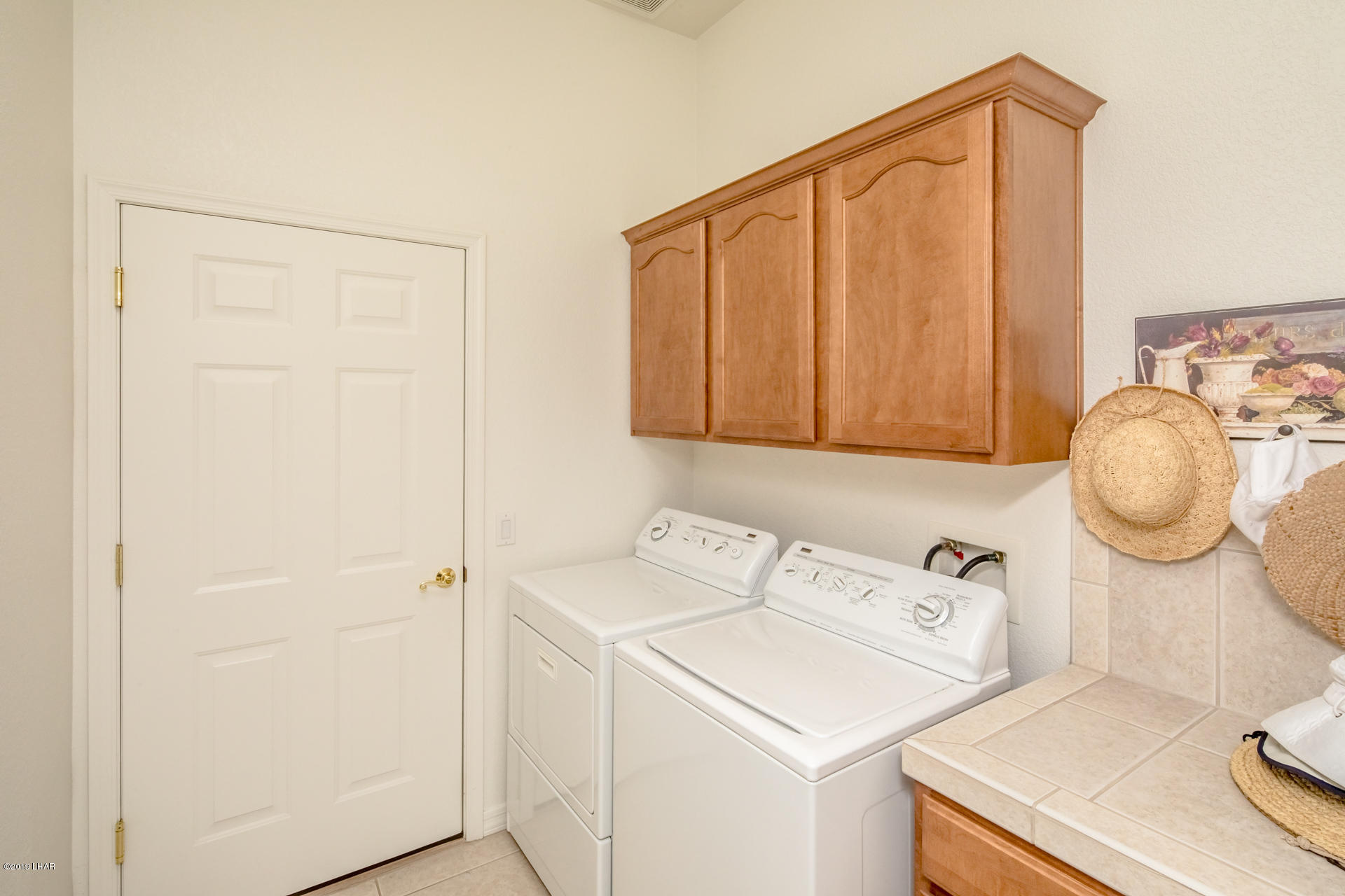 3889 Nottinghill Road Lake Havasu City, AZ 86404 - Photo 43 of 75 Utility Room. Door going to garage.