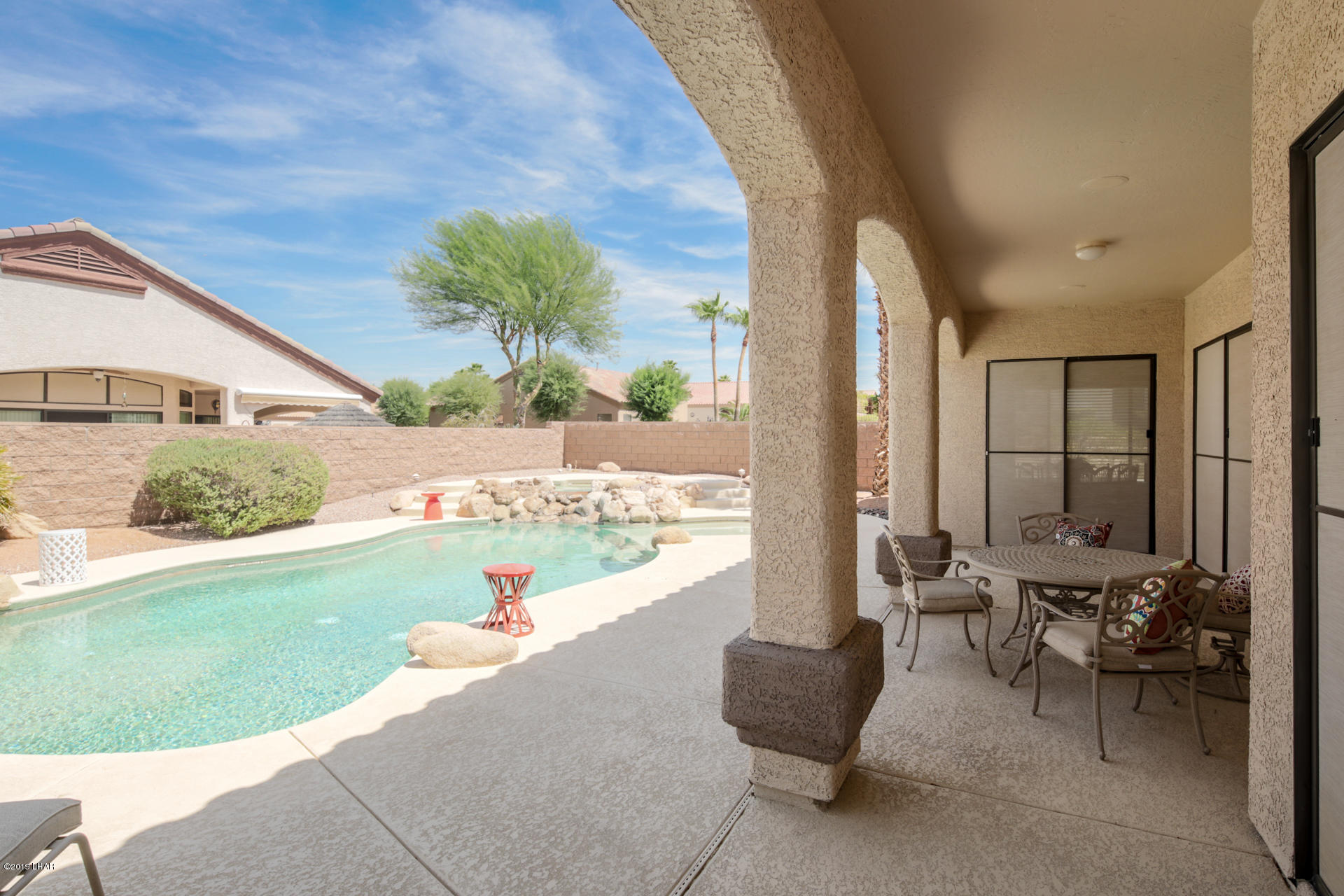 3889 Nottinghill Road Lake Havasu City, AZ 86404 - Photo 5 of 75 Game pool is shallow at each end and deep in the middle.