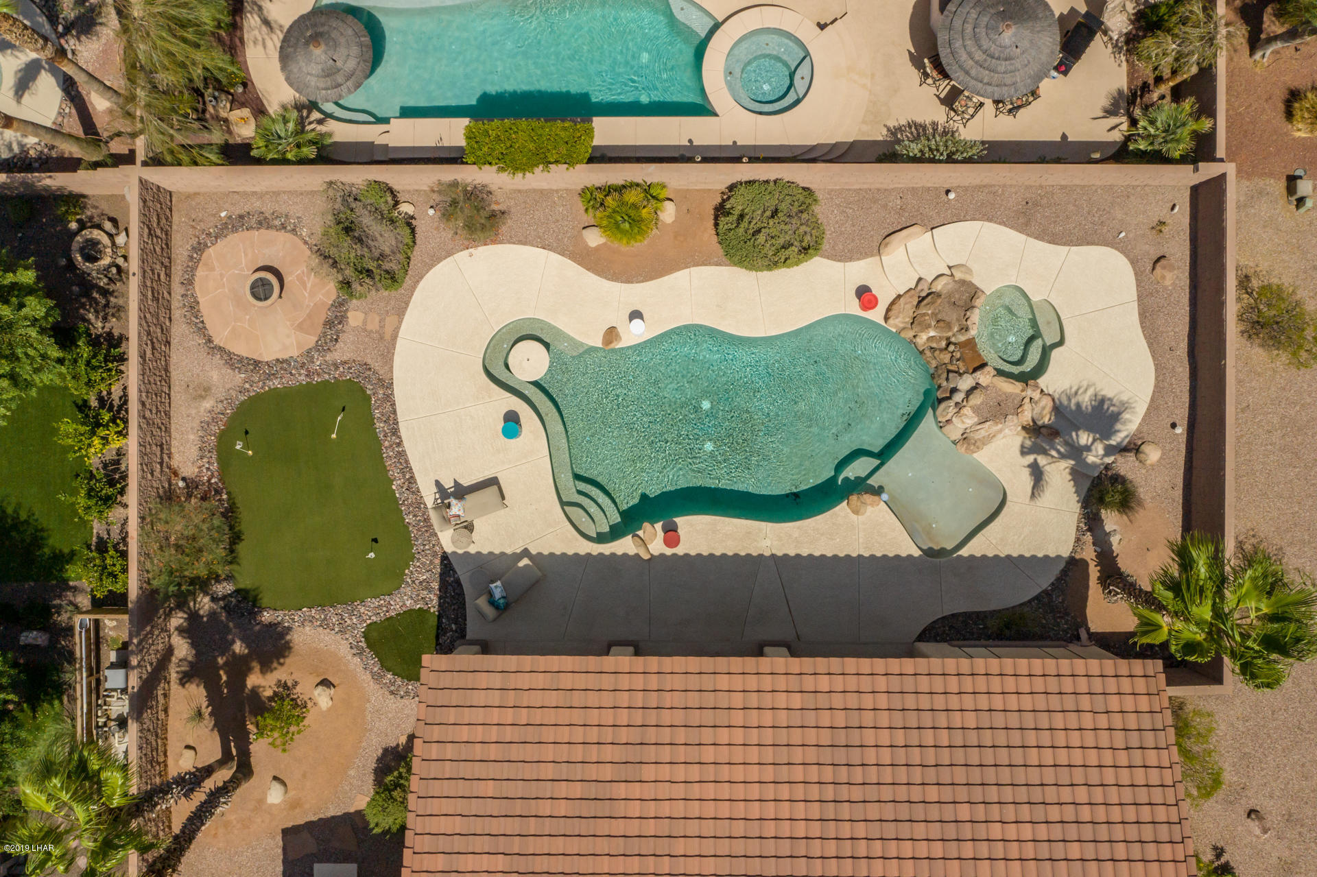 3889 Nottinghill Road Lake Havasu City, AZ 86404 - Photo 75 of 75 Game Pool, Spa, Putting Green and Firepit area.