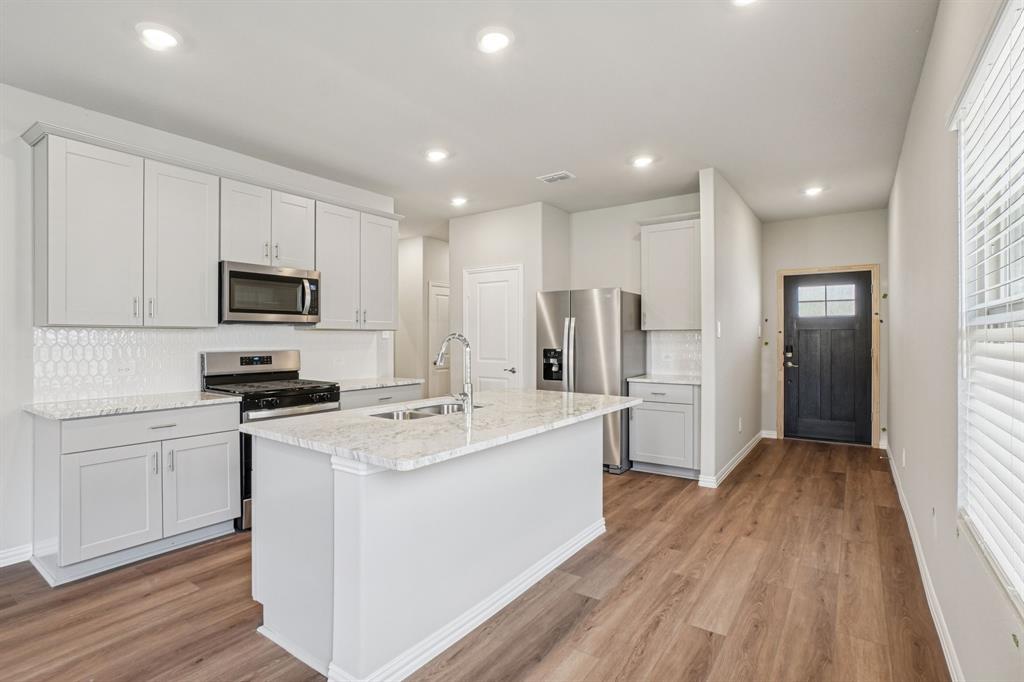 Photo is not of the actual home, but is an inspirational photo of builder’s model home and may depict options, furnishings, and/or decorator features that are not included.