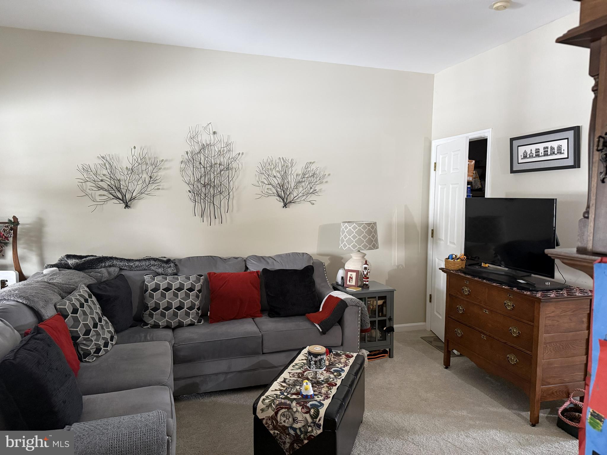 28 Charlemont Court Reading, PA 19607 - Photo 12 of 12 a living room with furniture and a flat screen tv