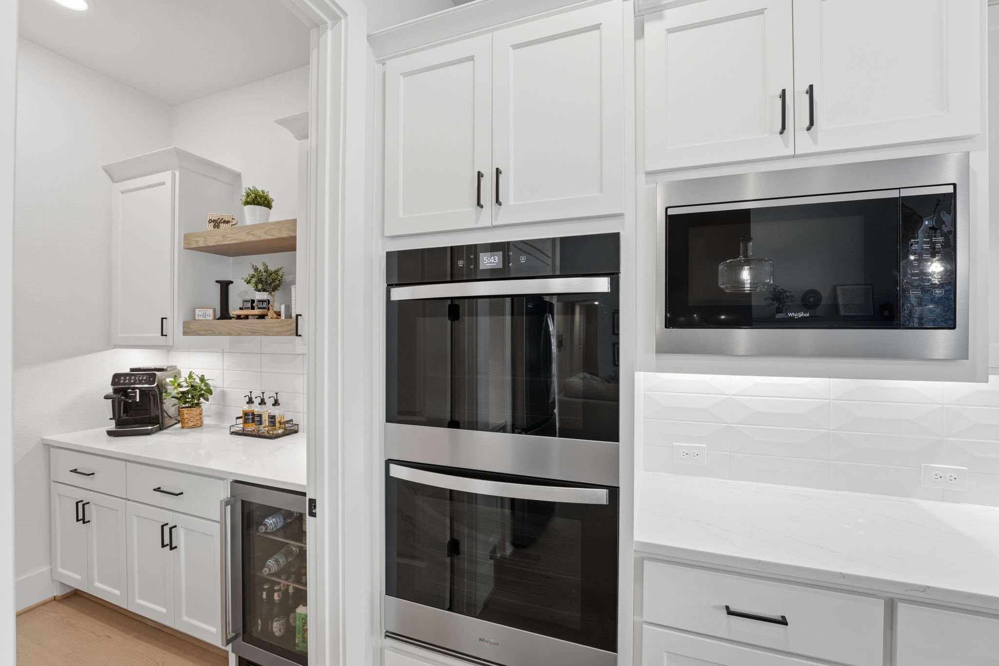 4708 Lorelai Lane Spring, TX 77386 - Photo 14 of 50 a kitchen with stainless steel appliances white cabinets and a stove