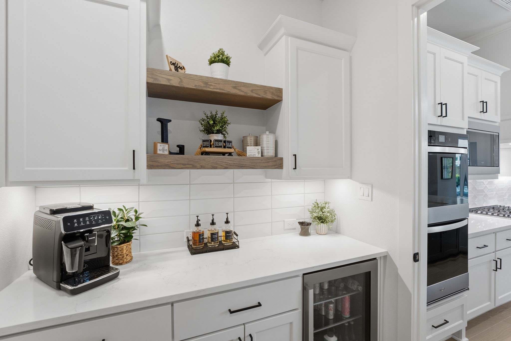 4708 Lorelai Lane Spring, TX 77386 - Photo 15 of 50 a kitchen with stainless steel appliances cabinets and counter space