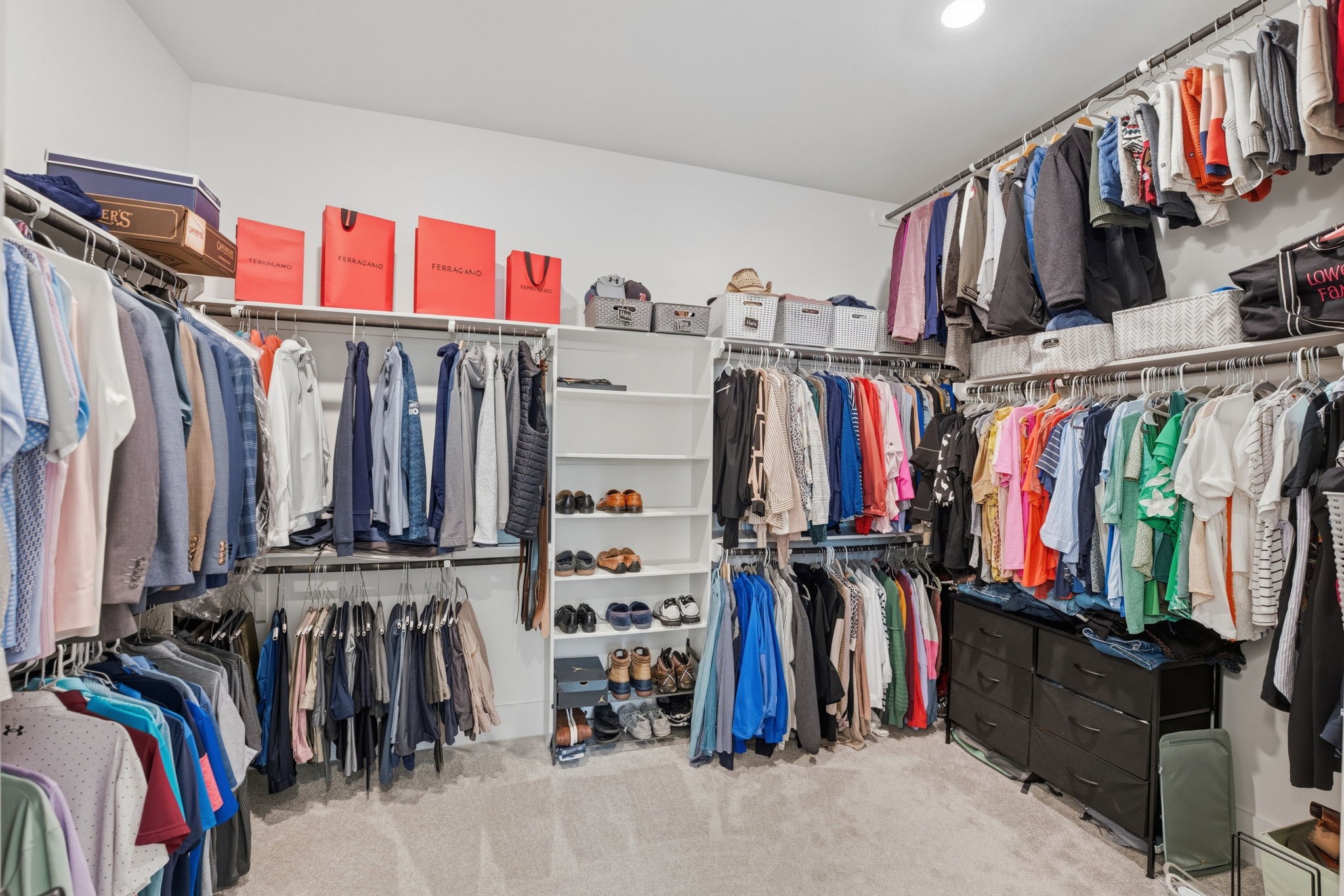 4708 Lorelai Lane Spring, TX 77386 - Photo 24 of 50 a view of walk in closet with clothes and shoes