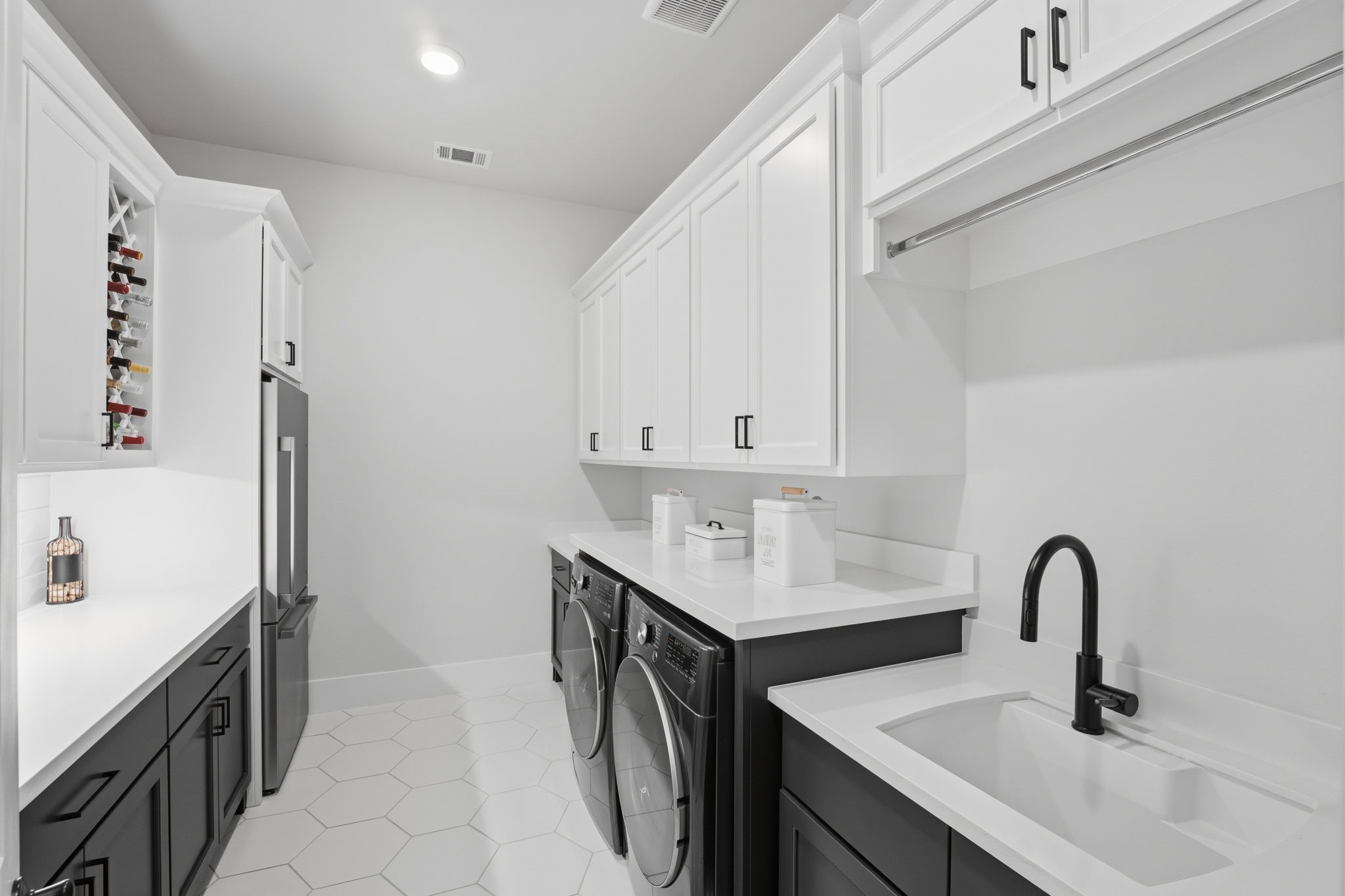 4708 Lorelai Lane Spring, TX 77386 - Photo 28 of 50 a bathroom with a sink double vanity and a bathtub