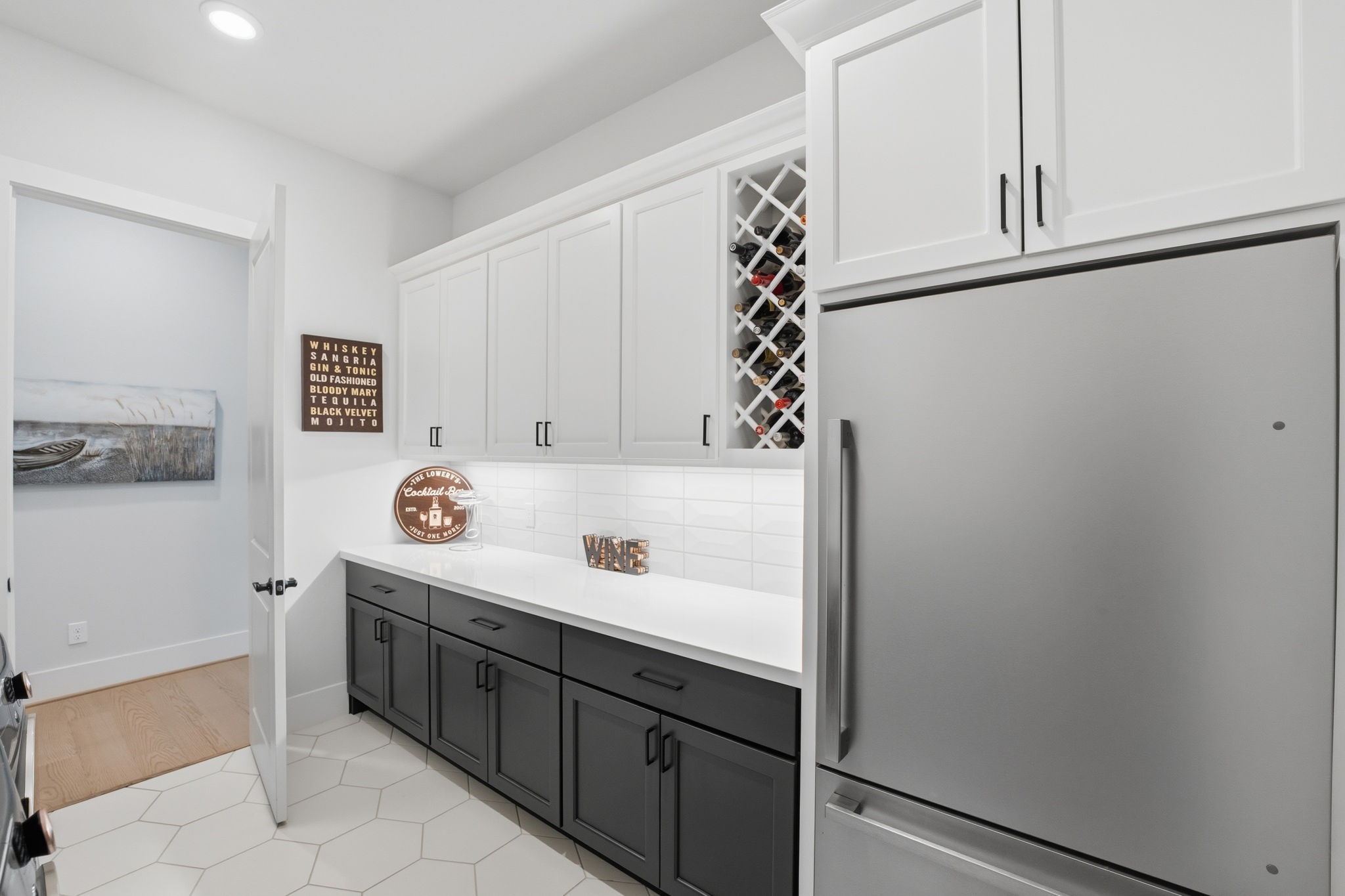 4708 Lorelai Lane Spring, TX 77386 - Photo 29 of 50 a utility room with cabinets washer and dryer