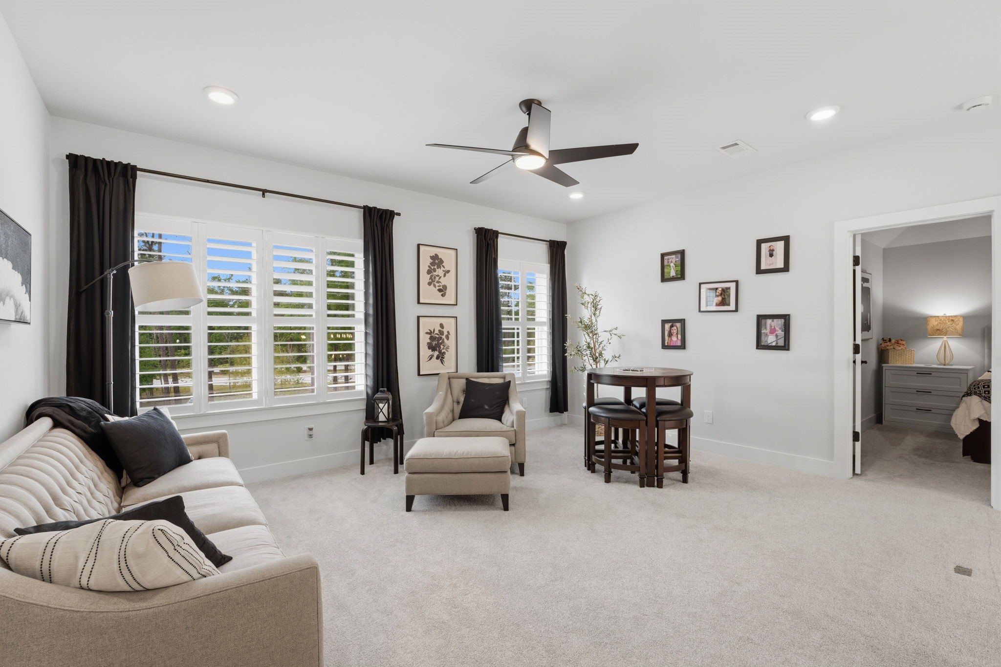 4708 Lorelai Lane Spring, TX 77386 - Photo 31 of 50 a living room with furniture and a large window
