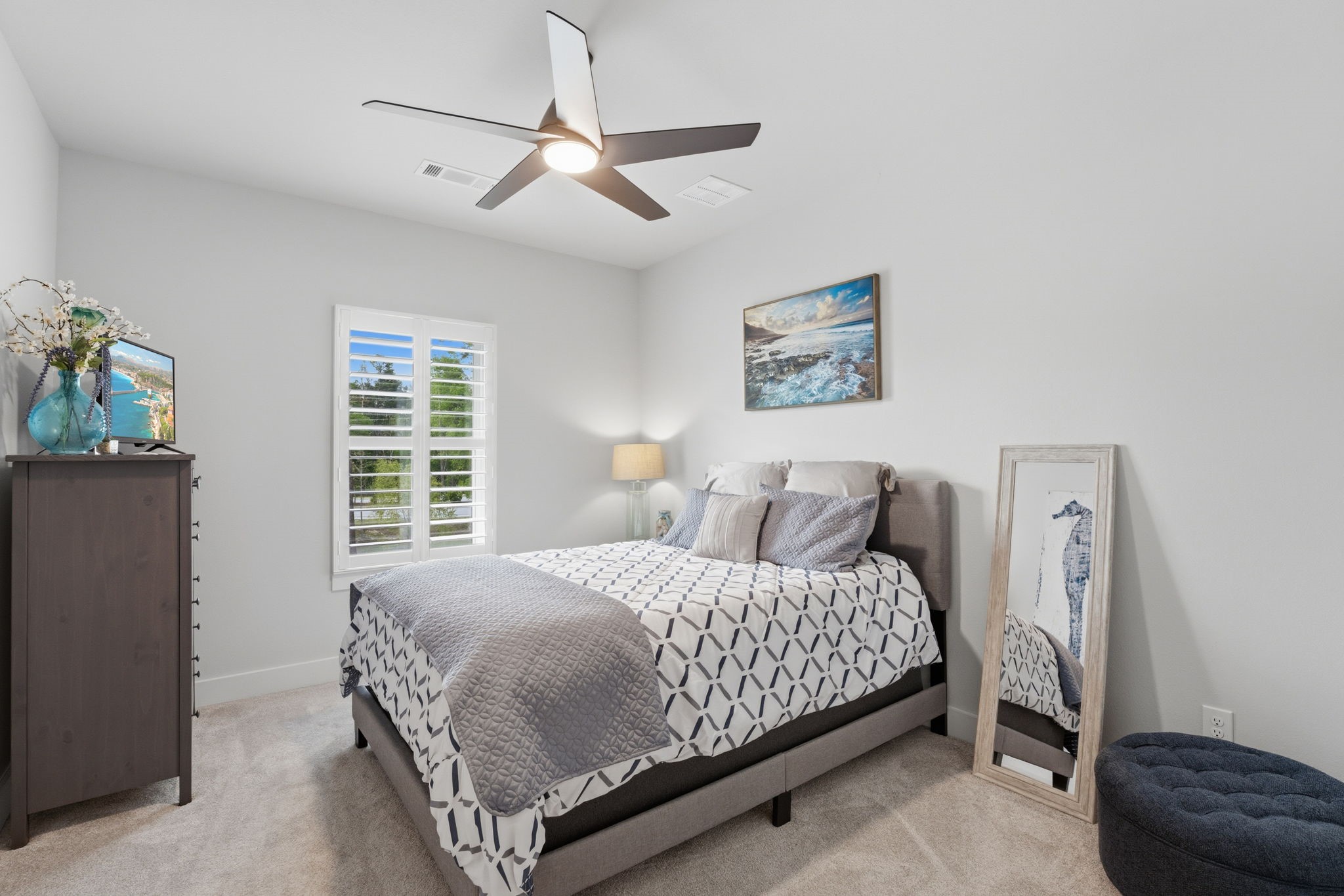 4708 Lorelai Lane Spring, TX 77386 - Photo 36 of 50 a bedroom with a bed chandelier and a window