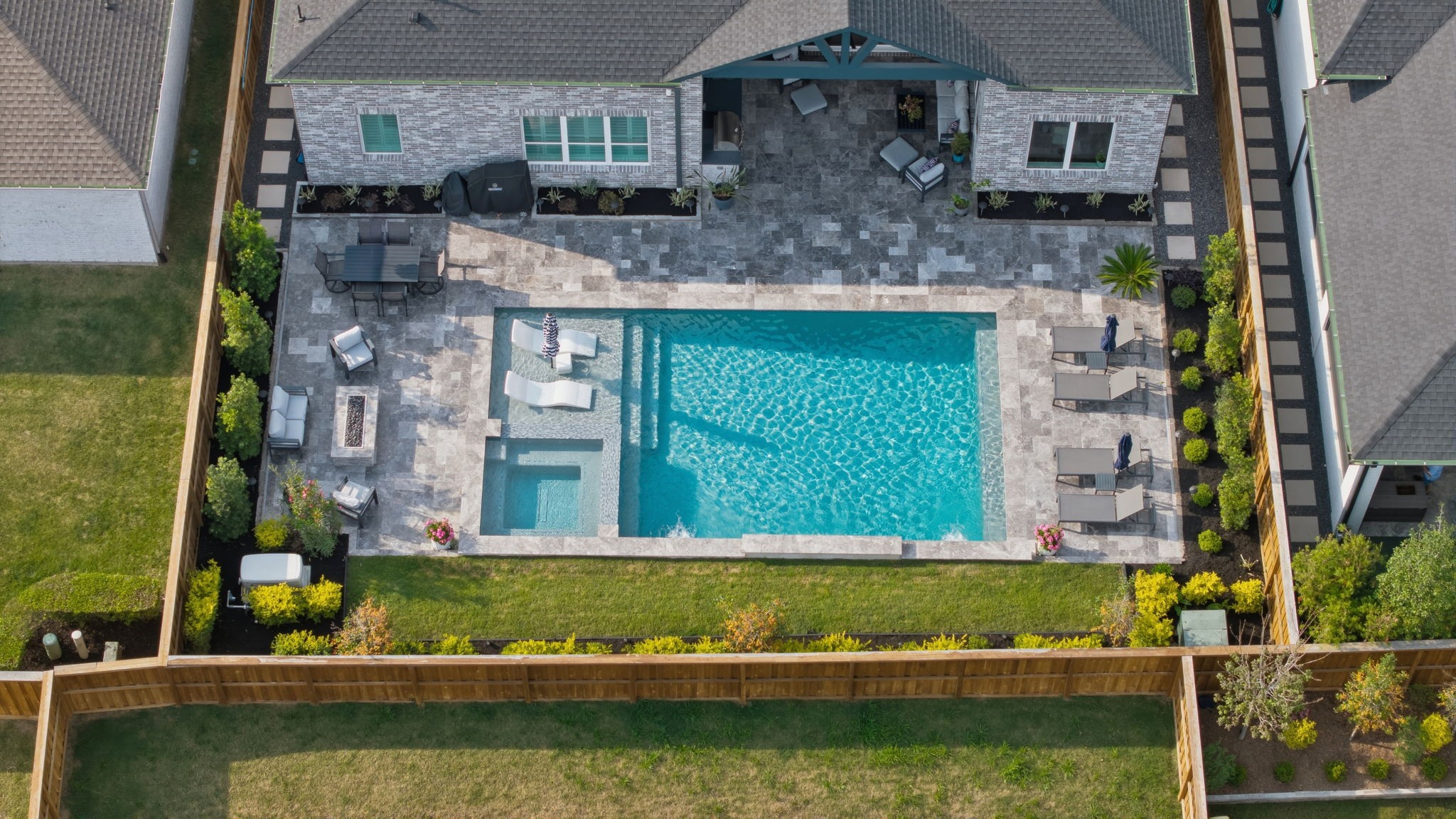 4708 Lorelai Lane Spring, TX 77386 - Photo 37 of 50 a view of a house with a swimming pool
