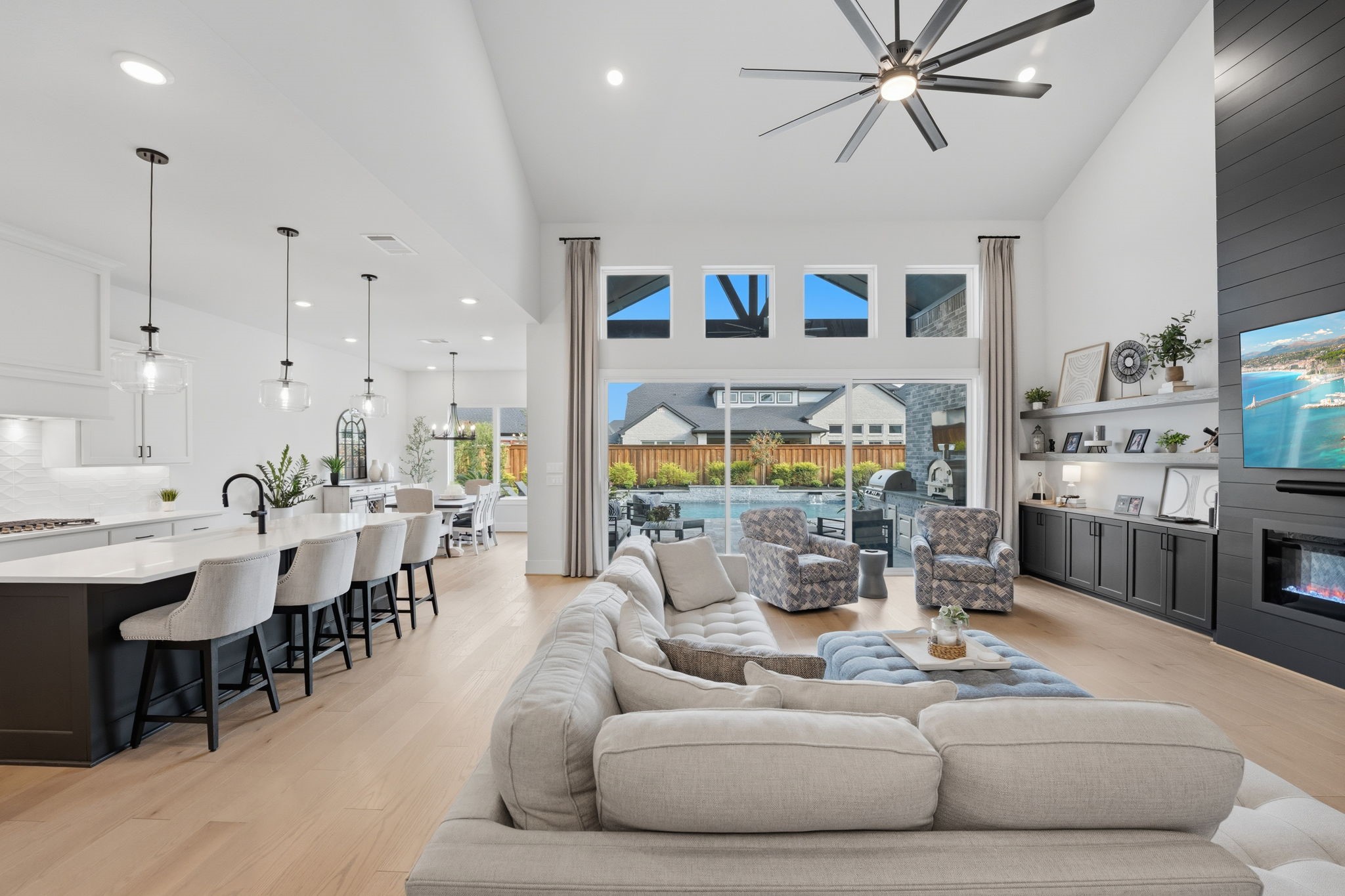 4708 Lorelai Lane Spring, TX 77386 - Photo 9 of 50 a living room with lots of furniture and view of kitchen