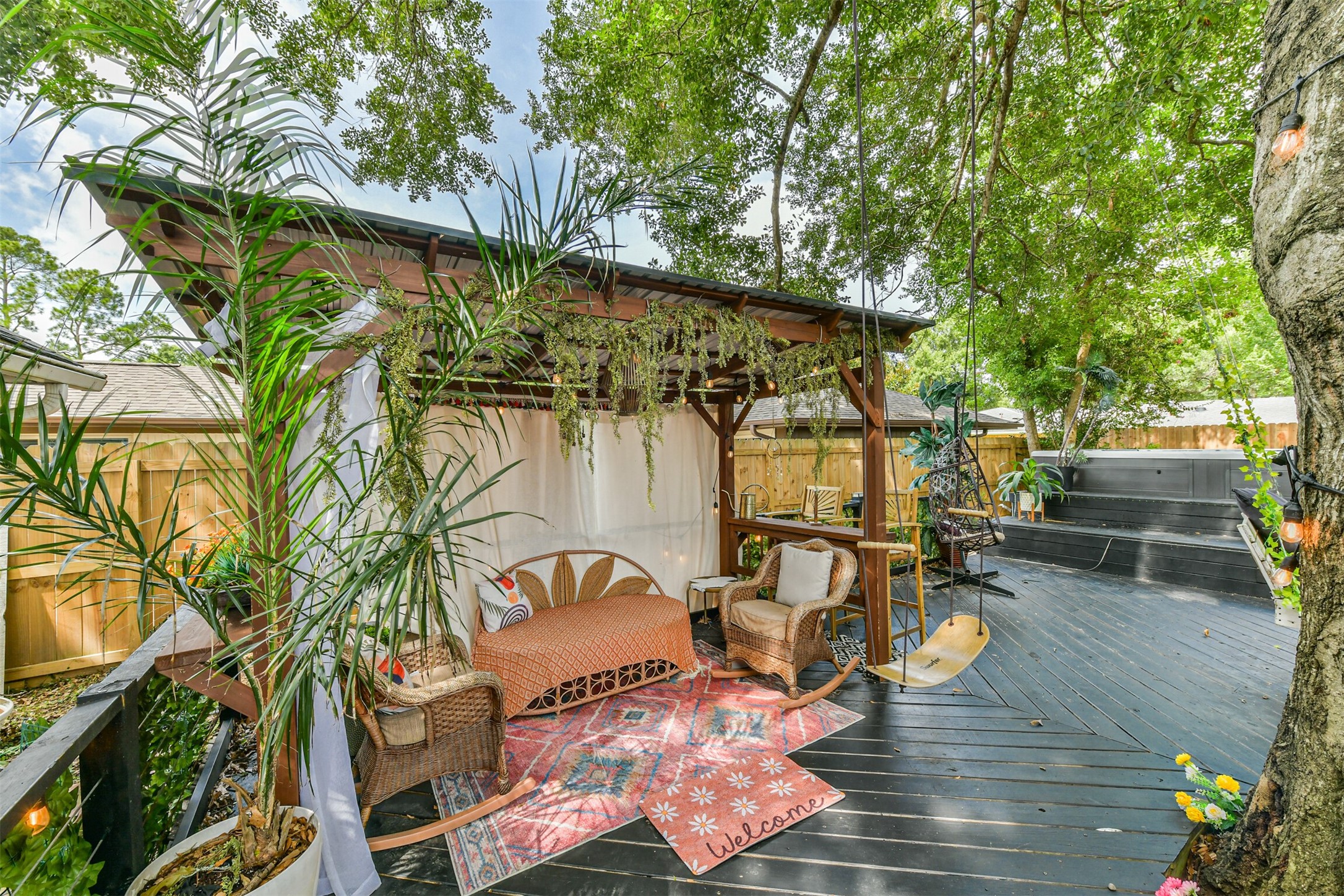 1723 Capstan Road Houston, TX 77062 - Photo 34 of 43 Relax beneath the pergola and enjoy the peaceful outdoor setting. One-of-a-kind swinging tree bed perfect for relaxing evenings.