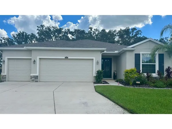 a black and white photo of a house