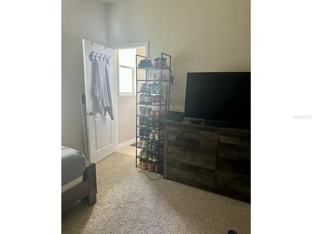 a view of a livingroom with furniture