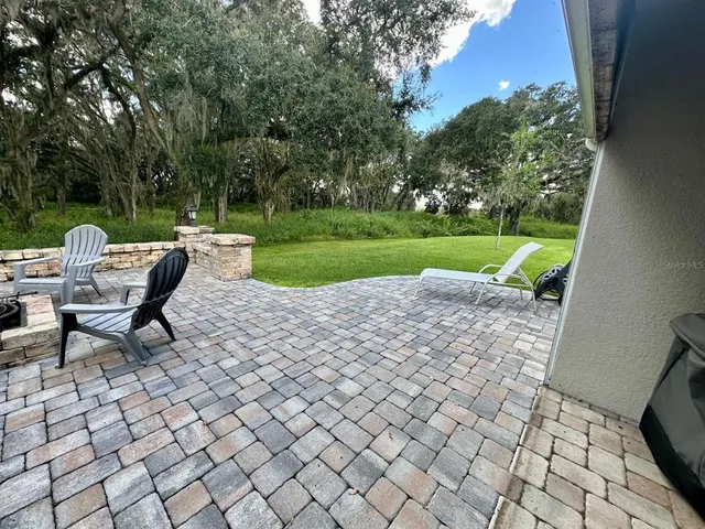 a view of a bench in a yard