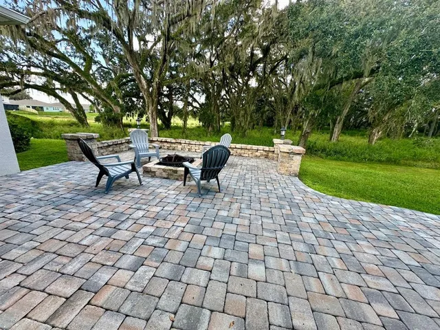 a park bench sitting in the middle of a park
