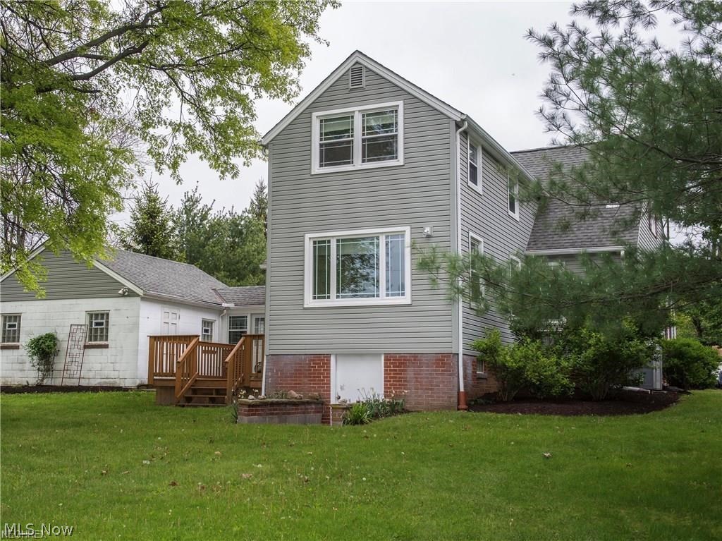 5360 Brainard Road Solon, OH 44139 - Photo 19 of 21 Back of house; the house sits on almost an acre! Storage under the house for yard tools or patio furniture!