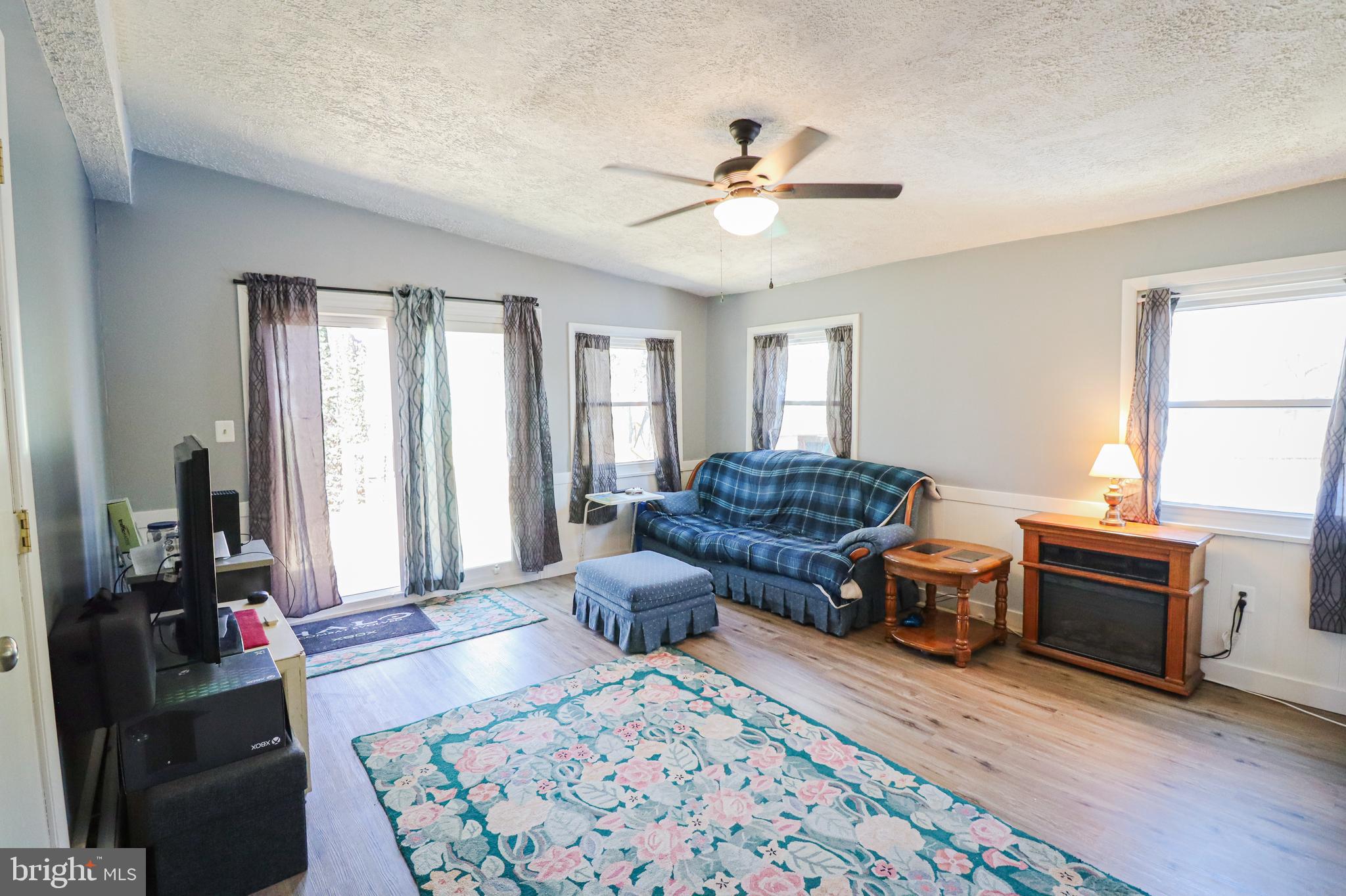 156 South Ritters Lane Owings Mills, MD 21117 - Photo 13 of 42 a living room with furniture and a window