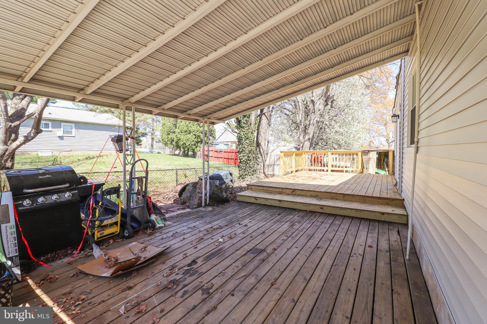 156 South Ritters Lane Owings Mills, MD 21117 - Photo 40 of 42 a view of a room with wooden floor and furniture