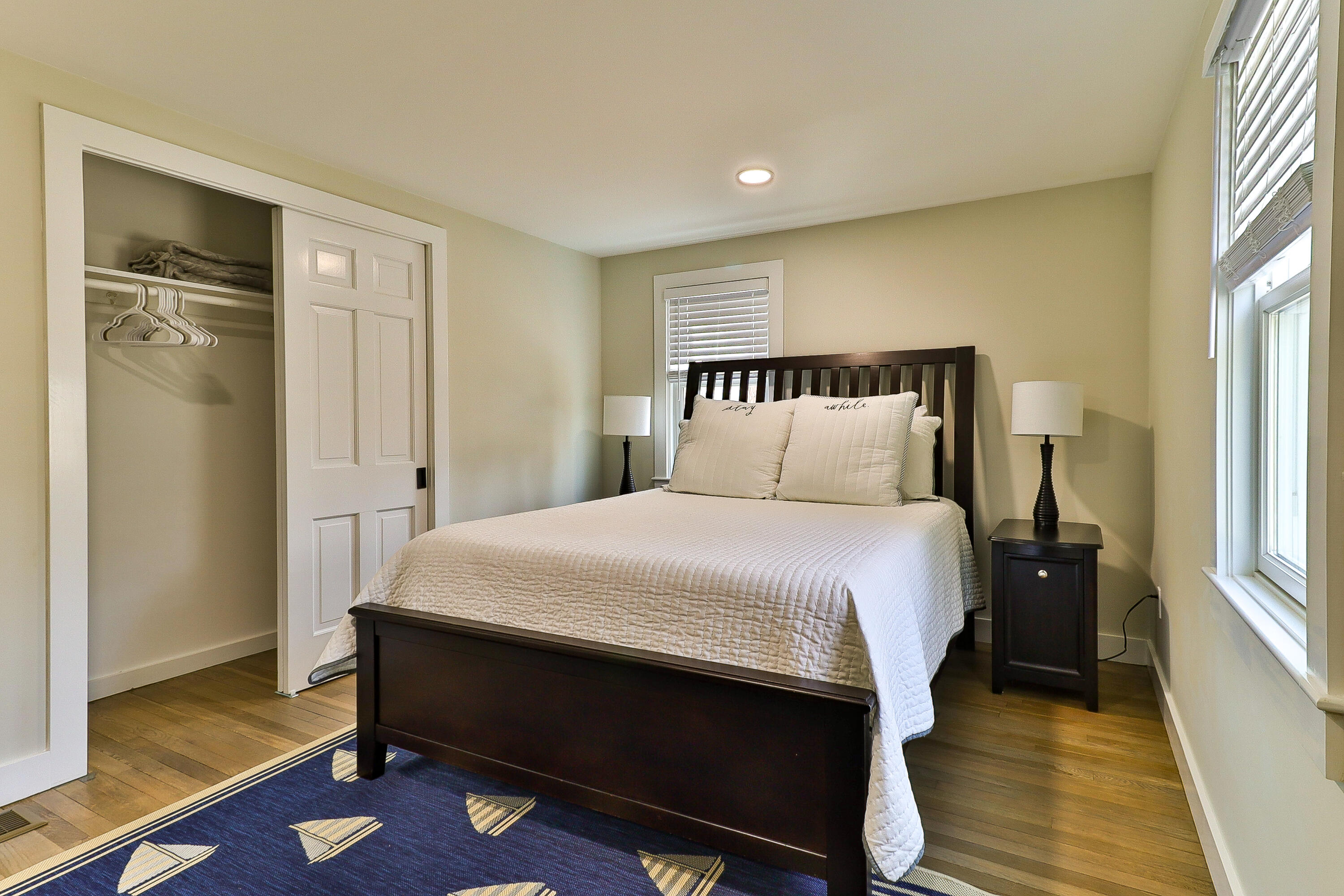 49 Huckins Neck Road Centerville, MA 02632 - Photo 12 of 23 a bedroom with a bed and a window